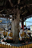 Myanmar - Sagaing, Shwe-kyet-kay a pagoda on a steep bank of the River close to the two parallel bridges linking Sagaing and Amarapura. 